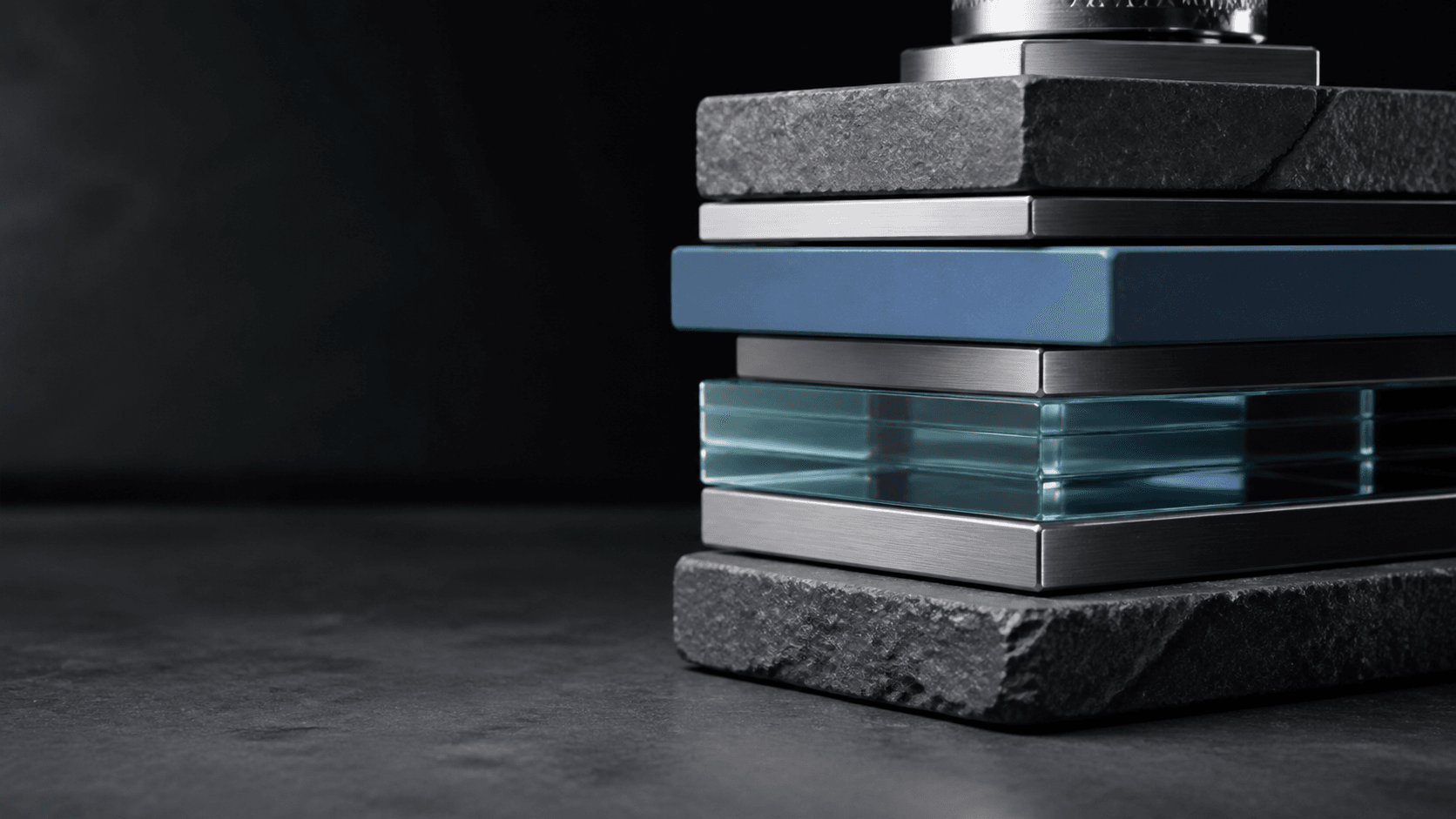 Stone, steel and glass layers forming a calibrated capital stack